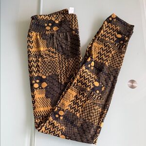 LuLaRoe OS Black and mustard yellow Patterned Leggings